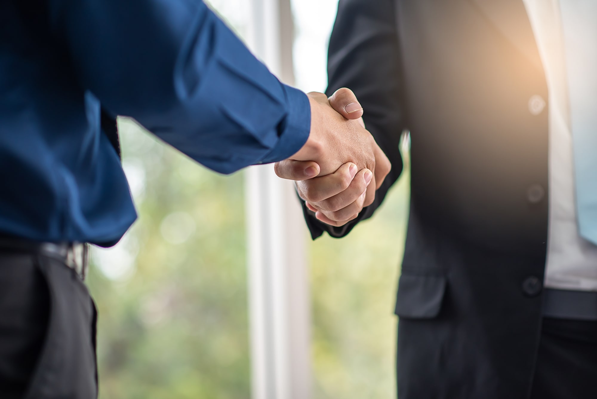 Growth Era_Partners_2_business-people-join-hand-together-or-handshake-ag-2022-11-17-08-47-18-utc-min